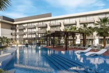 Modern and Partly Furnished with Park View | Apartment For Sale In Oakley Square Residences JVC Dubai